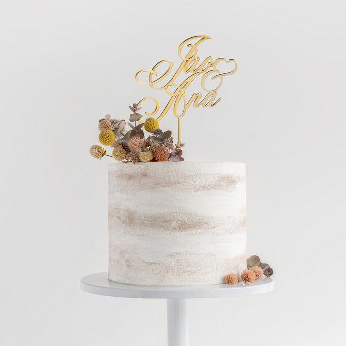 Classic Wedding Acrylic Cake Topper on a cake